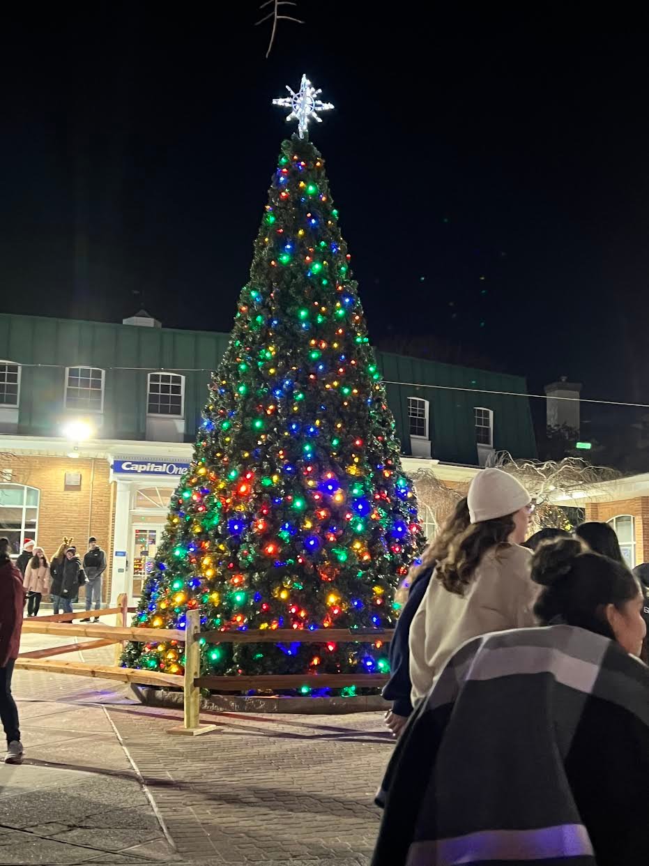 As is the tradition, mayor Paul Pontieri lit the Christmas tree in front of Chase Bank, immediately after Santa made his grand entrance atop an elaborately decorated fire truck.